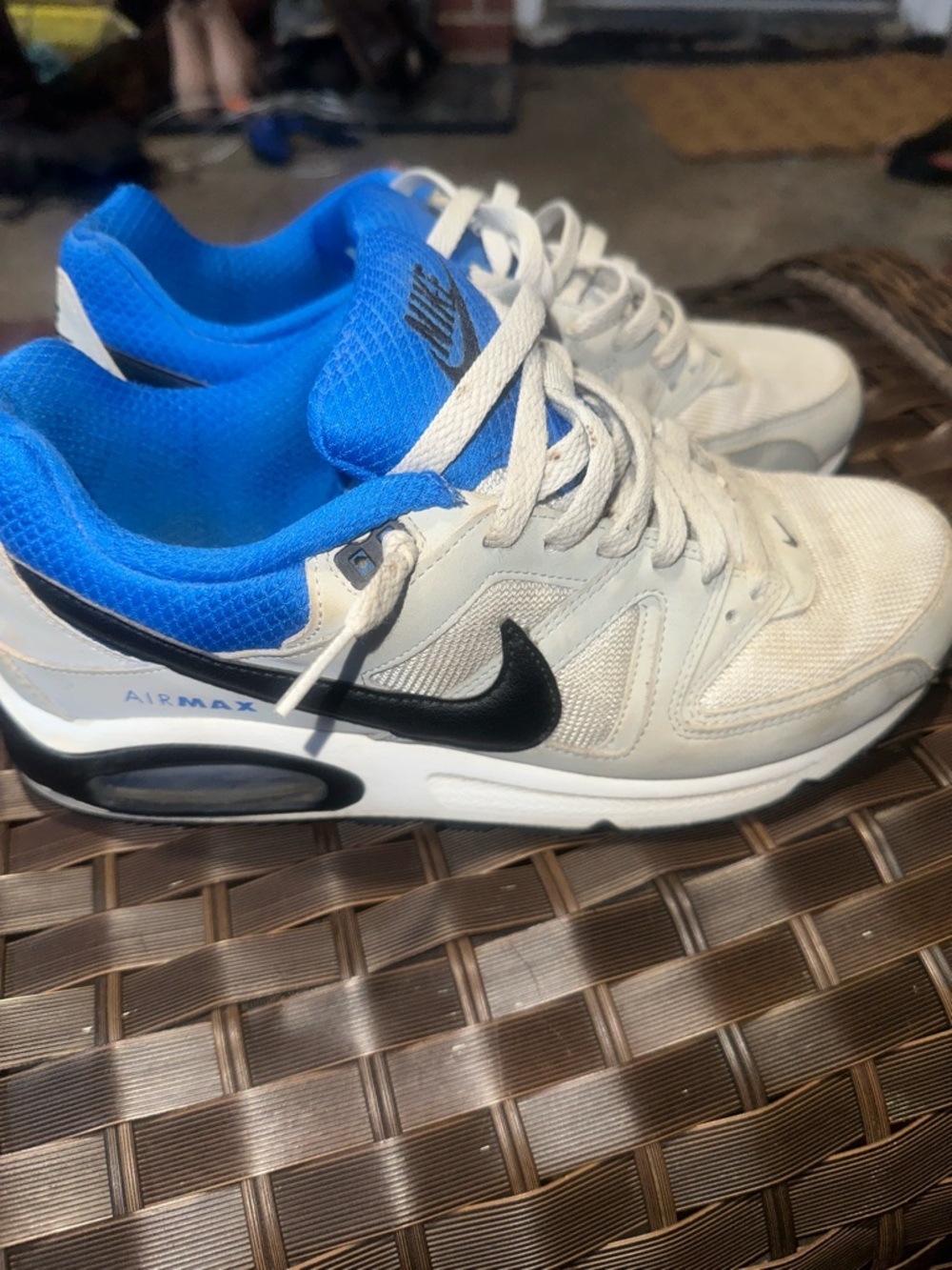 Nike White Sneakers with Blue Lining and Black Swoosh